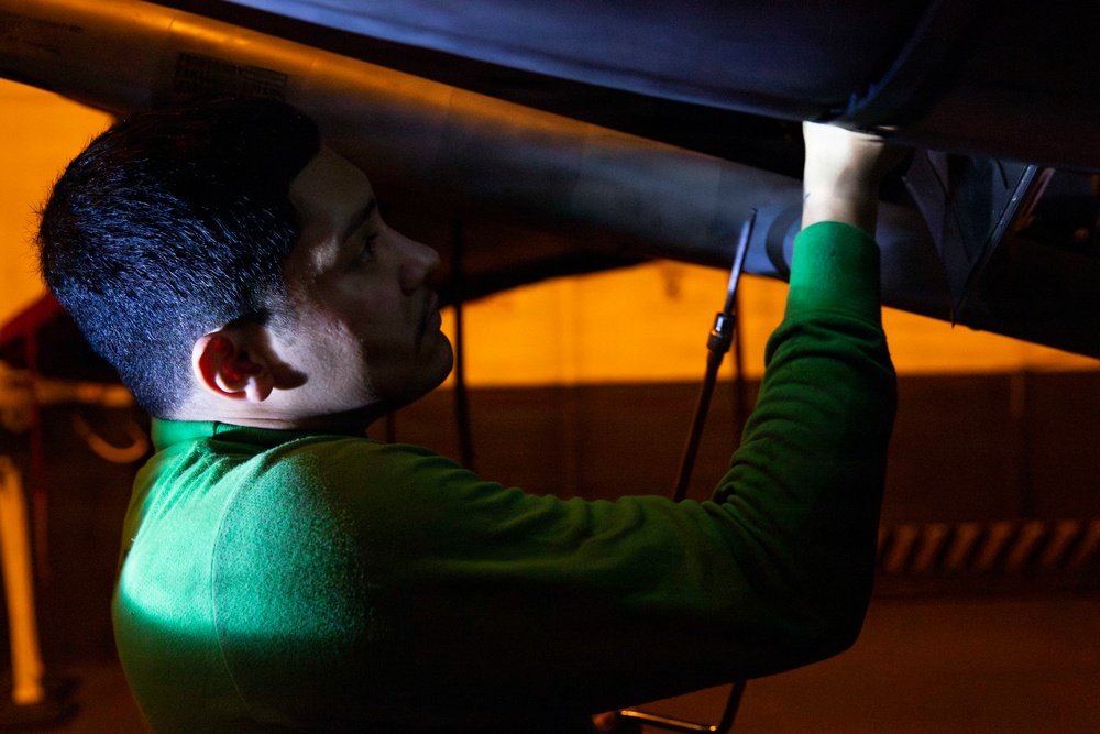 Abraham Lincoln conducts routine aircraft maintenance