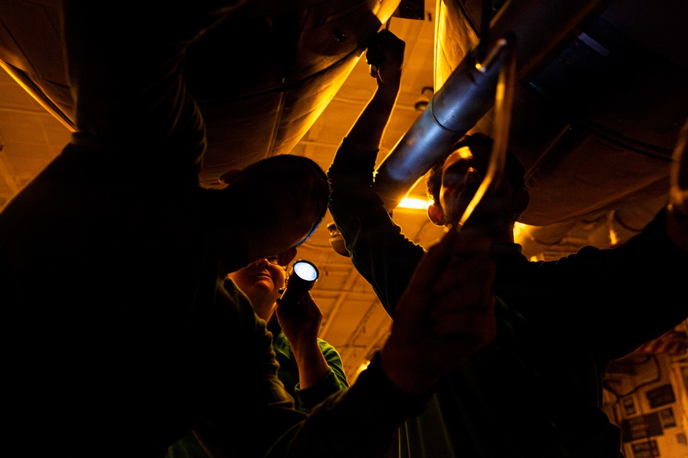 Abraham Lincoln conducts routine aircraft maintenance