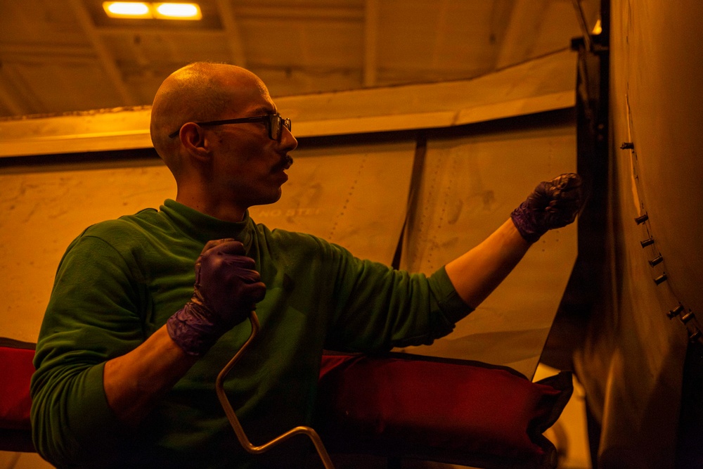 Abraham Lincoln conducts routine aircraft maintenance