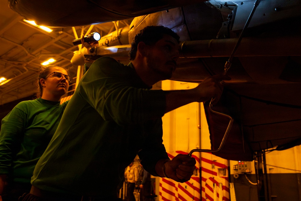 Abraham Lincoln conducts routine aircraft maintenance