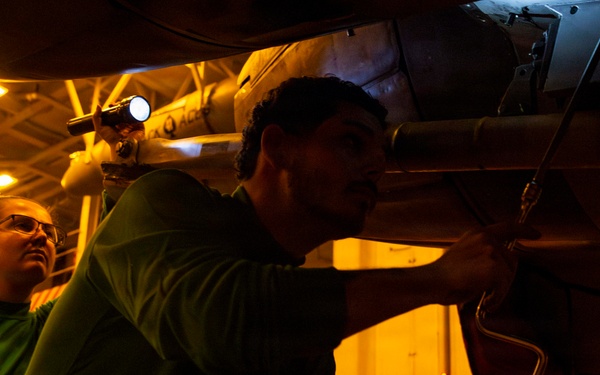 Abraham Lincoln conducts routine aircraft maintenance