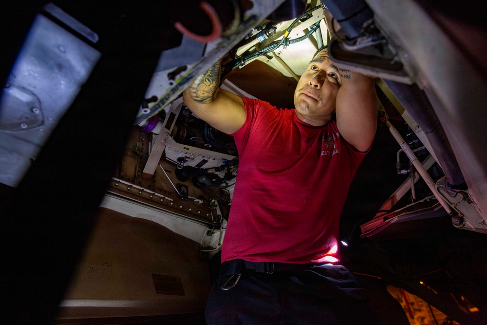 Abraham Lincoln conducts routine aircraft maintenance