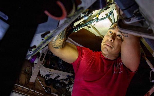 Abraham Lincoln conducts routine aircraft maintenance