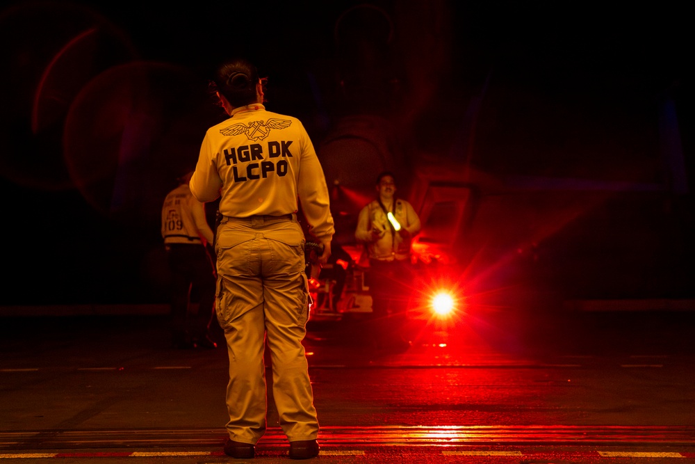 Abraham Lincoln conducts routine aircraft maintenance