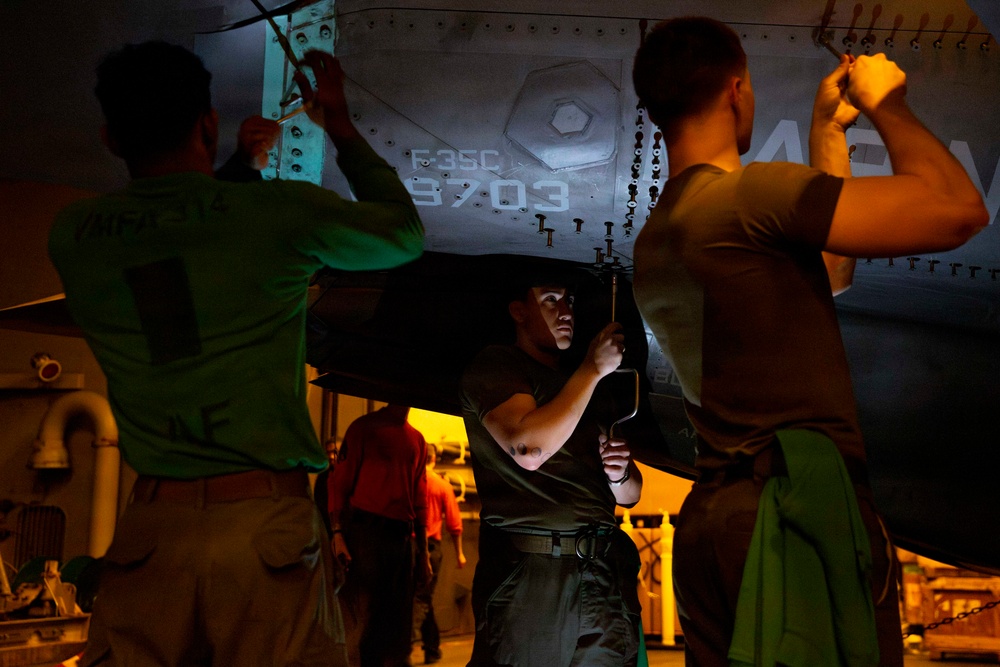 Abraham Lincoln conducts routine aircraft maintenance