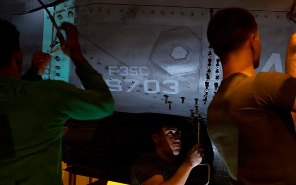 Abraham Lincoln conducts routine aircraft maintenance