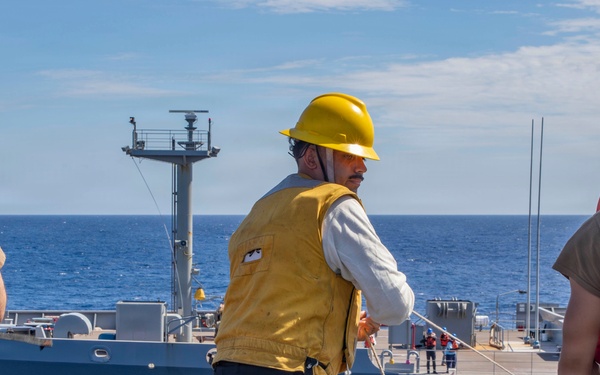 Abraham Lincoln conducts a replenishment-at-sea with Yukon