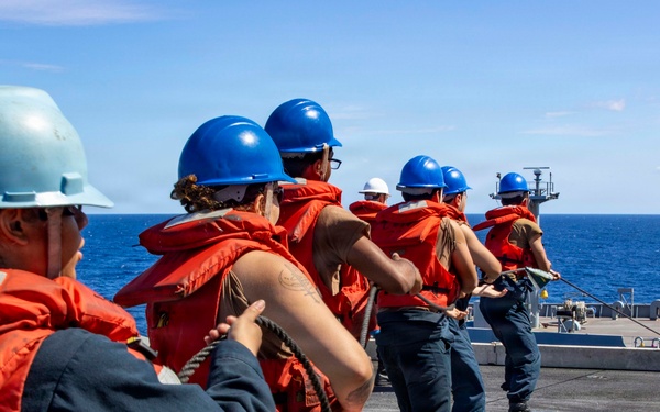 Abraham Lincoln conducts a replenishment-at-sea with Yukon