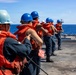 Abraham Lincoln conducts a replenishment-at-sea with Yukon