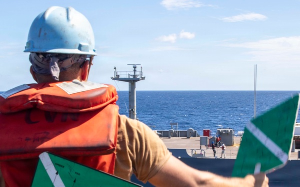 Abraham Lincoln conducts a replenishment-at-sea with Yukon