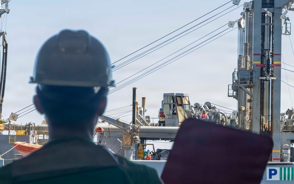 Abraham Lincoln conducts a replenishment-at-sea with Yukon