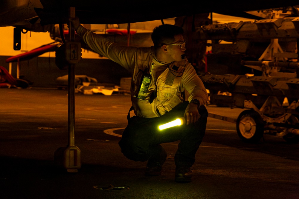 Abraham Lincoln conducts routine aircraft maintenance