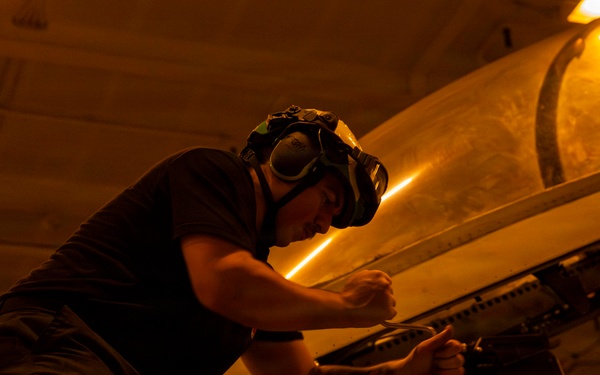 Abraham Lincoln conducts routine aircraft maintenance