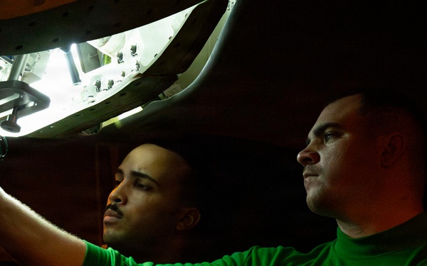 Abraham Lincoln conducts routine aircraft maintenance