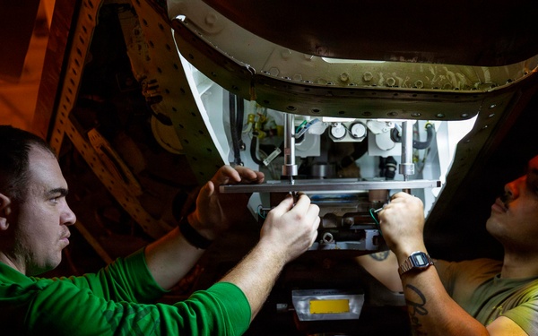 Abraham Lincoln conducts routine aircraft maintenance