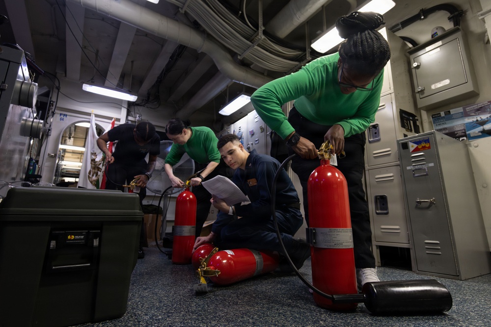 Abraham Lincoln conducts routine maintenance