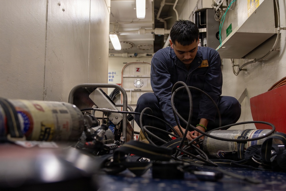 Abraham Lincoln conducts routine maintenance