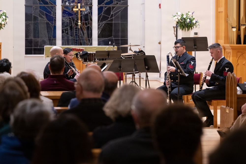 Members of the U.S. Navy Band perform in a chamber ensemble concert