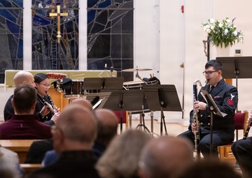 Members of the U.S. Navy Band perform in a chamber ensemble concert