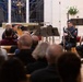 Members of the U.S. Navy Band perform in a chamber ensemble concert
