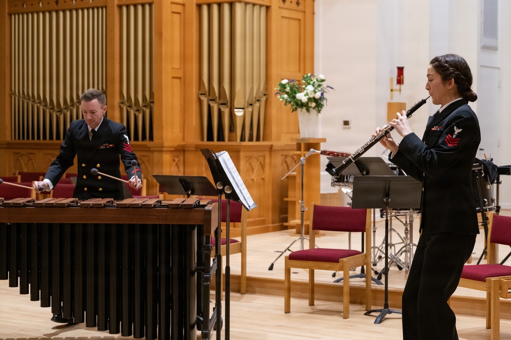 Members of the U.S. Navy Band perform in a chamber ensemble concert