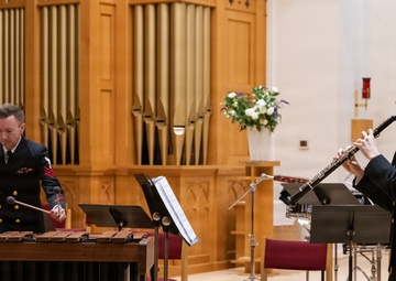 Members of the U.S. Navy Band perform in a chamber ensemble concert