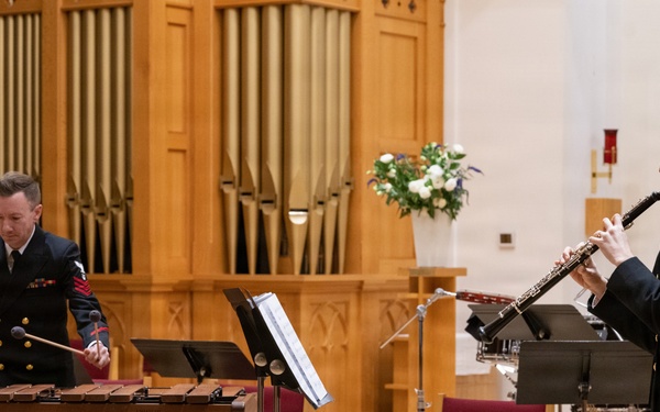 Members of the U.S. Navy Band perform in a chamber ensemble concert