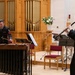 Members of the U.S. Navy Band perform in a chamber ensemble concert
