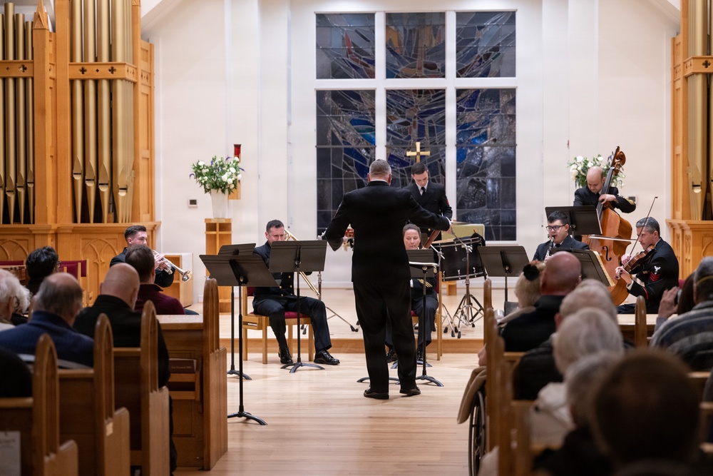 Members of the U.S. Navy Band perform in a chamber ensemble concert