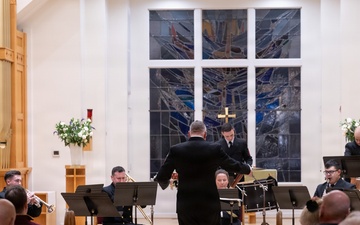 Members of the U.S. Navy Band perform in a chamber ensemble concert