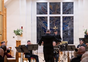 Members of the U.S. Navy Band perform in a chamber ensemble concert