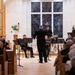 Members of the U.S. Navy Band perform in a chamber ensemble concert