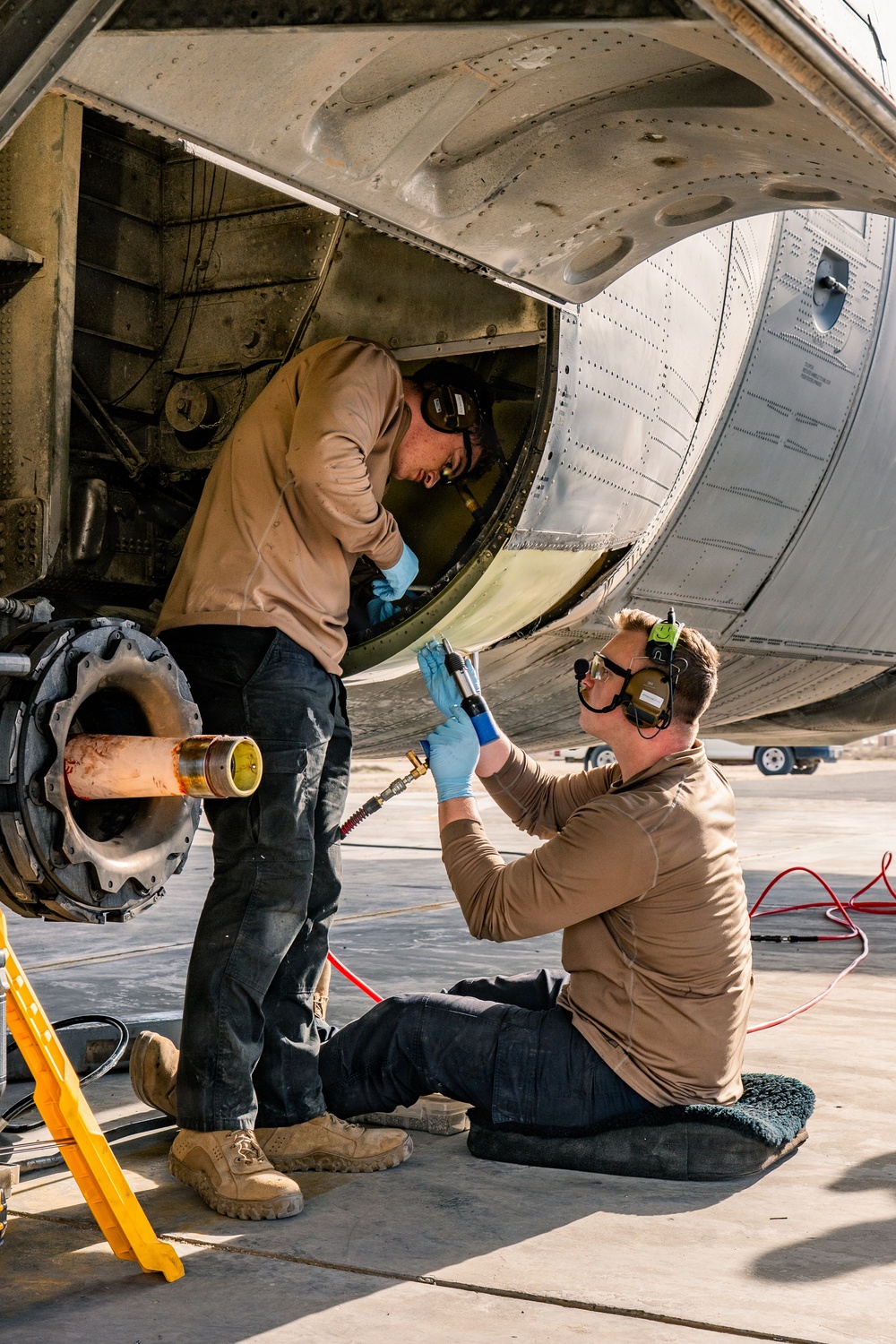 386th AEW Aircraft Metals Specialists Perform Maintenance on a C-130