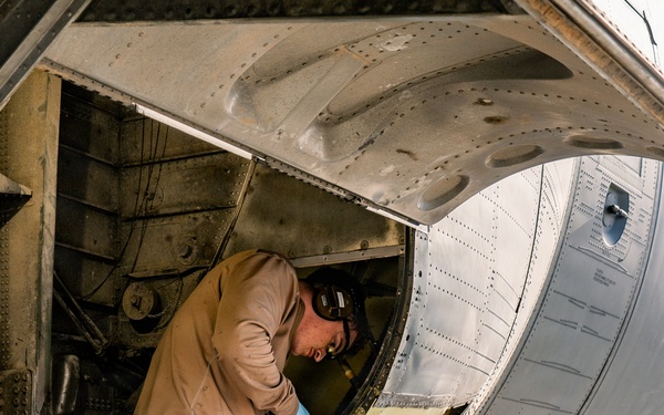 386th AEW Aircraft Metals Specialists Perform Maintenance on a C-130