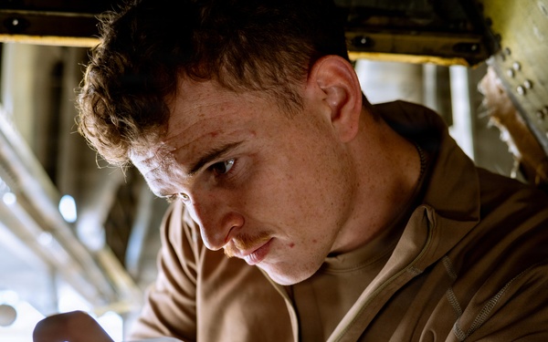 386th AEW Aircraft Metals Specialists Perform Maintenance on a C-130