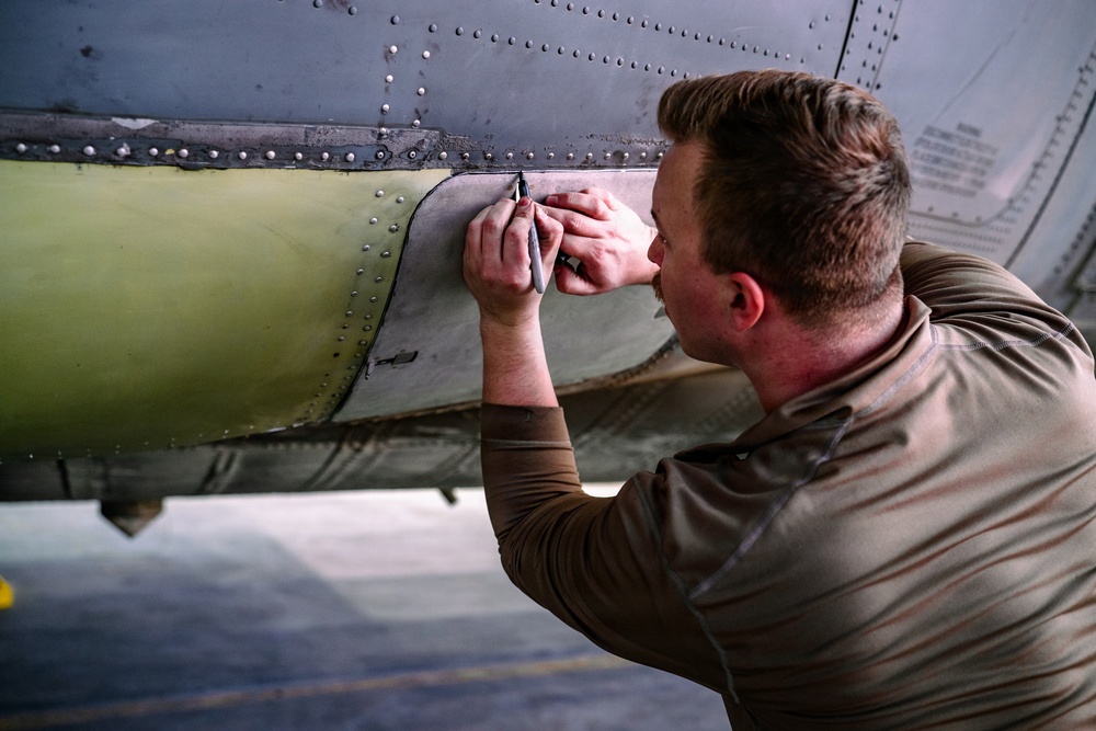 386th AEW Aircraft Metals Specialists Perform Maintenance on a C-130