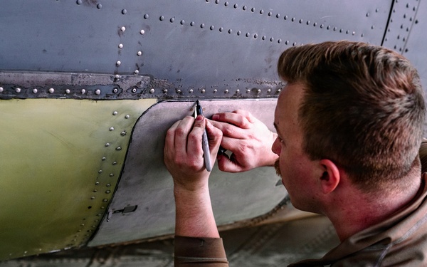 386th AEW Aircraft Metals Specialists Perform Maintenance on a C-130