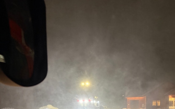 Coast Guard Air Station Traverse City personnel transport woman from Beaver Island in Lake Michigan