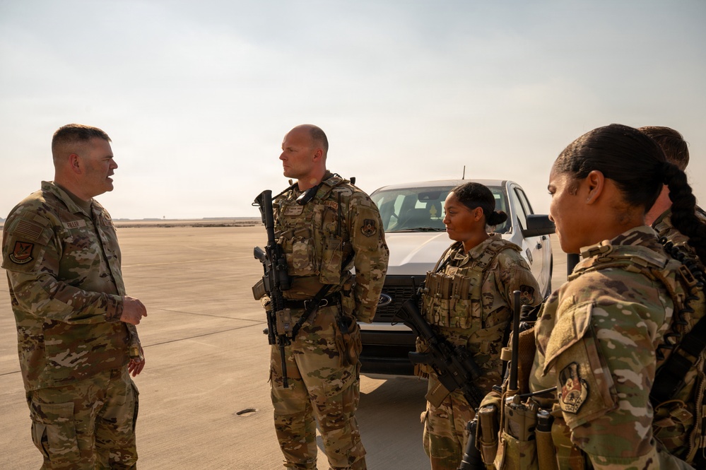 Brig Gen Brian A. Filler visits Defenders at 379 AEW