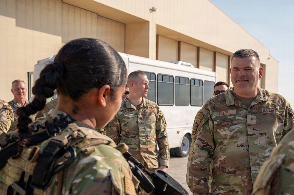 Brig Gen Brian A. Filler visits Defenders at 379 AEW