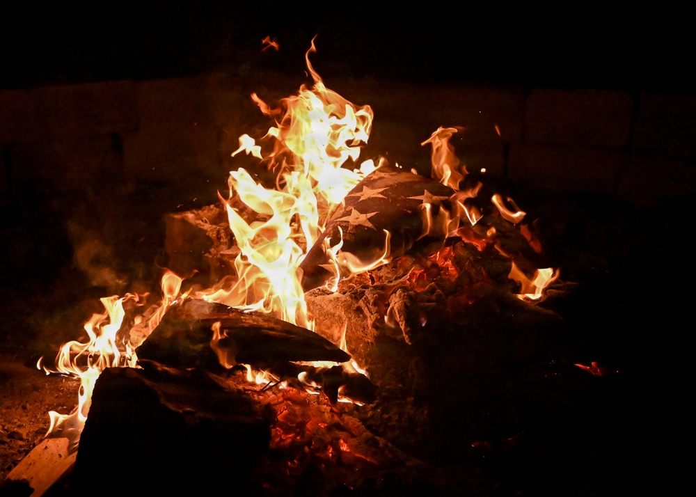Honor Guard retires American flags