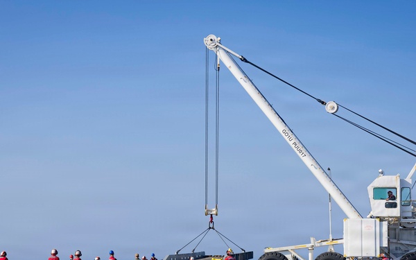 USS Iwo Jima Sailors Direct Crane