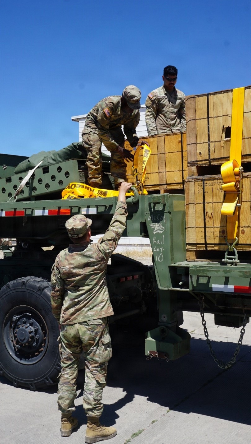National Guard practice strapping ammunition for outload at Tooele Army Depot
