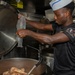 Culinary Specialists prepare dinner for the crew aboard USS Bulkeley (DDG 84)