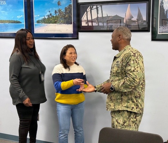 Capt. Wilson coins two NSA Mid-South employees for performance