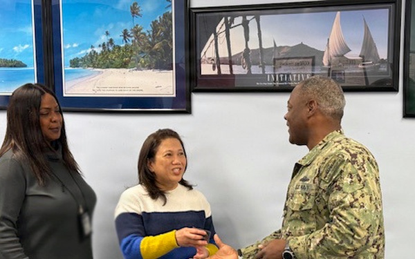 Capt. Wilson coins two NSA Mid-South employees for performance