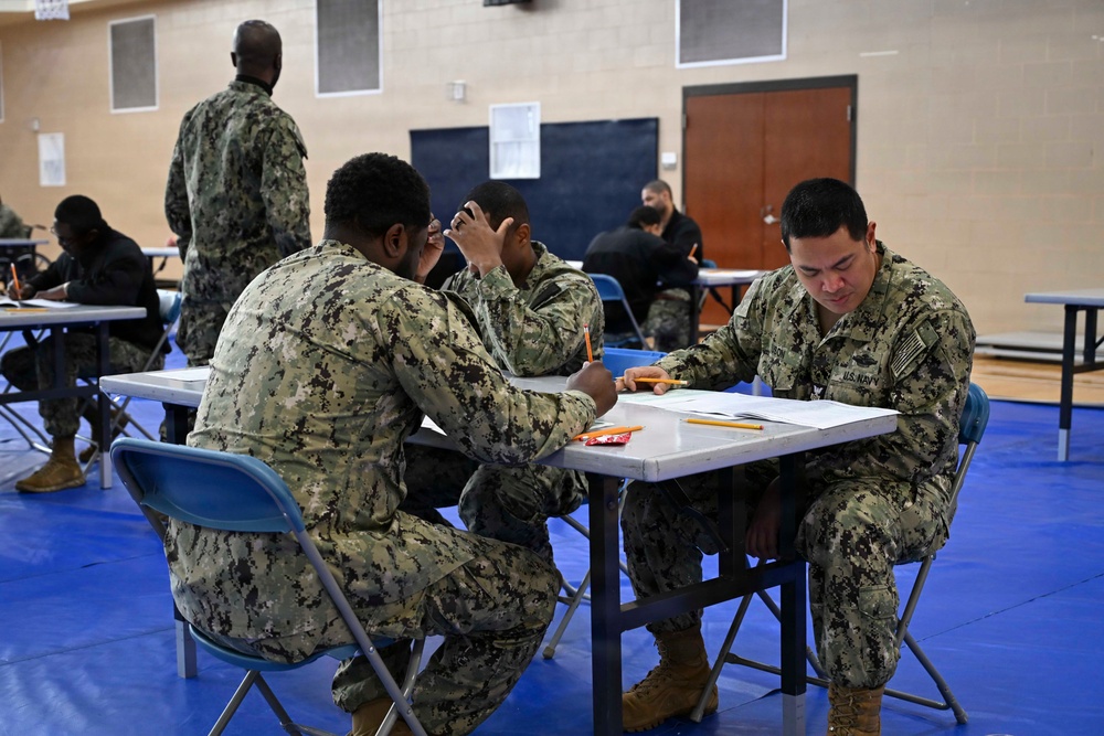Sailors assigned to NMRTC Bethesda and other tenant commands take the Navy Wide E-7 Advancement