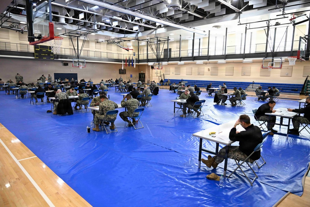 Sailors assigned to NMRTC Bethesda and other tenant commands take the Navy Wide E-7 Advancement