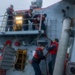 Sailors load ammunition aboard USS Bulkeley (DDG 84)