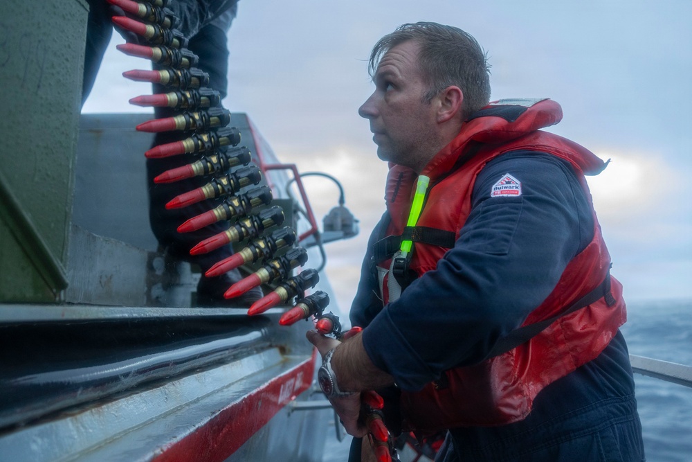 Sailors load ammunition aboard USS Bulkeley (DDG 84)